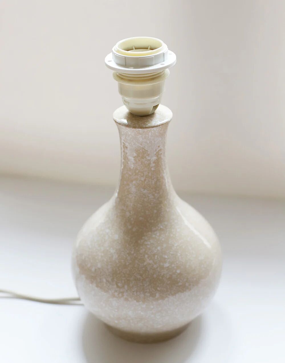 Vintage table lamp, 1950s ceramic base and beige gingham shade.