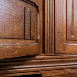 Old solid wood wardrobe with three vintage mirror doors