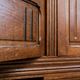 Old solid wood wardrobe with three vintage mirror doors