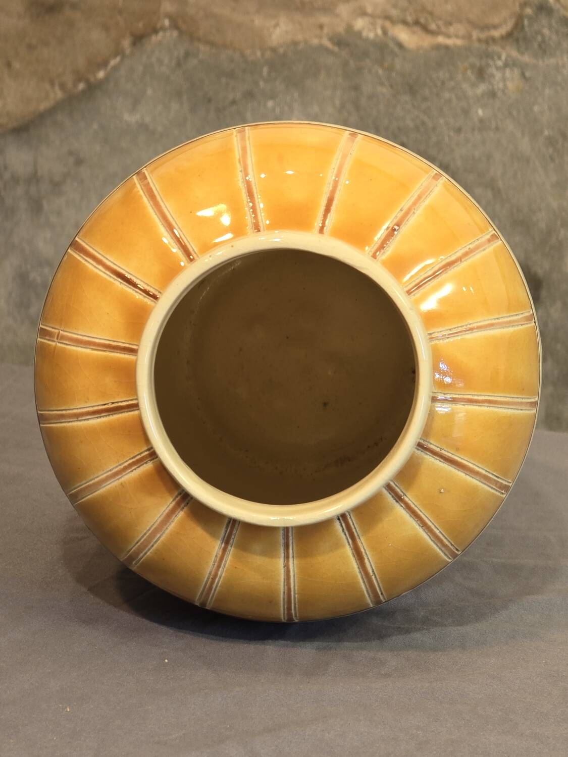 Orange and green ceramic vase with duck motif