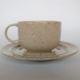 Coffee cup and vintage pyrity sandstone subcup