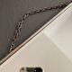 Vintage barber mirror and chain