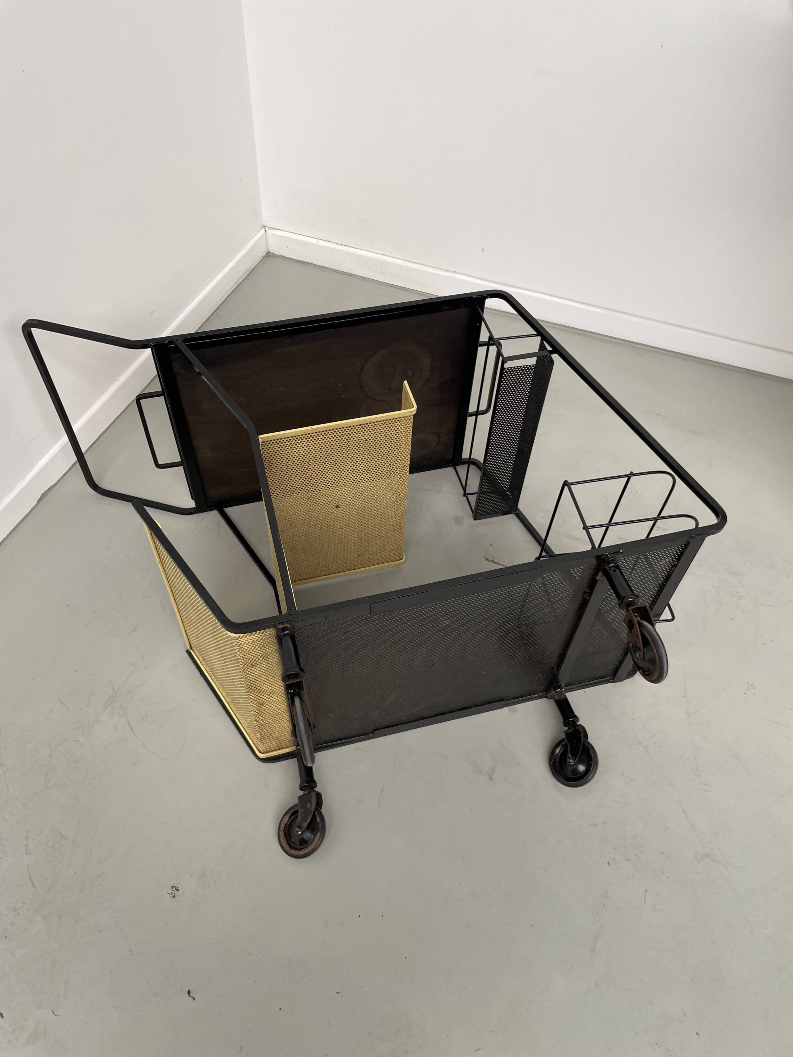 Perforated metal serving trolley in the Mathieu Matégot style