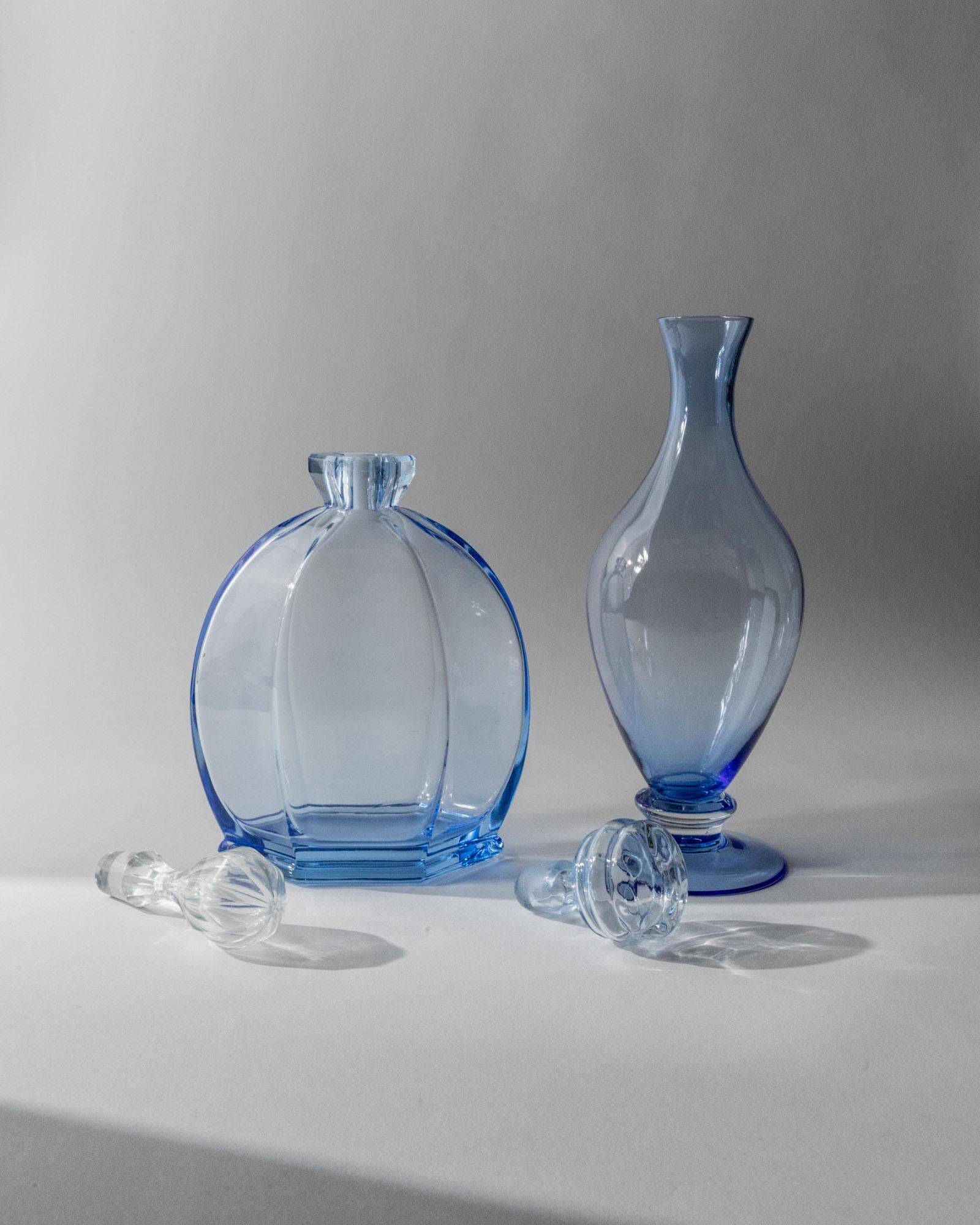 Set of 2 vintage Murano glass carafes from the 1940s, blue art glass with stoppers.