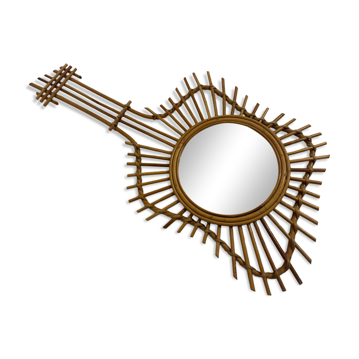 The vintage guitar rattan mirror.