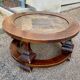 Table basse ronde en pierre et bois