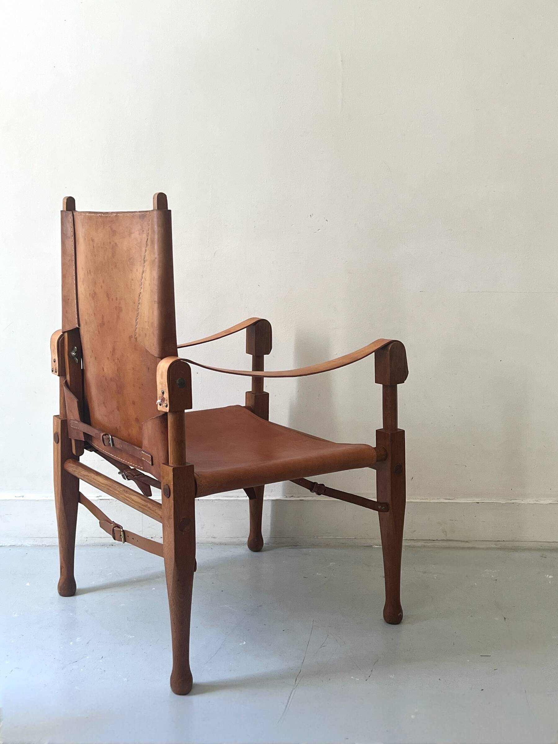 Safari armchair in wood & cognac leather by Wilhelm Kienzle for Wohnbedarf 1950