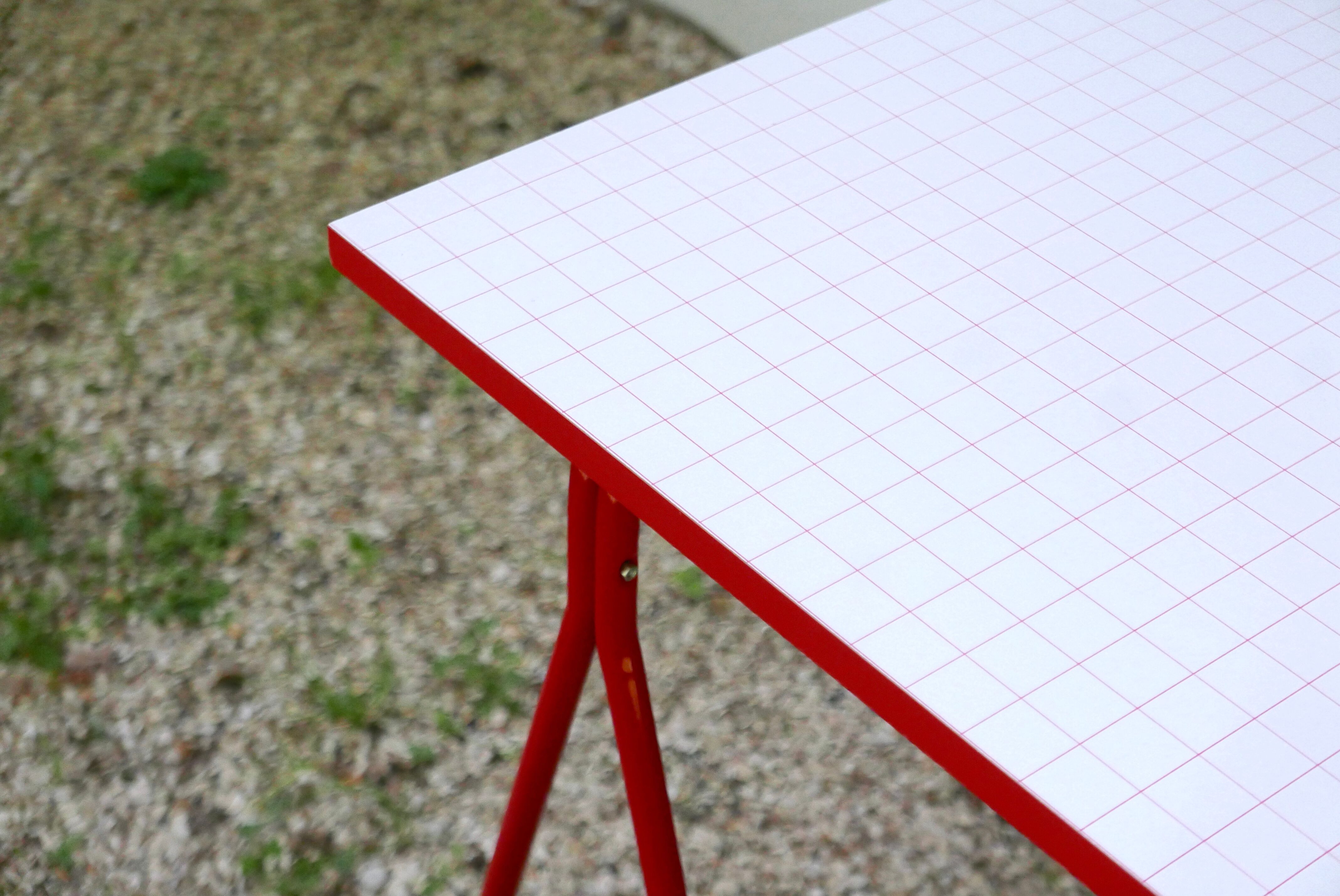 Desk with red trestles, white plaid tray, 80s