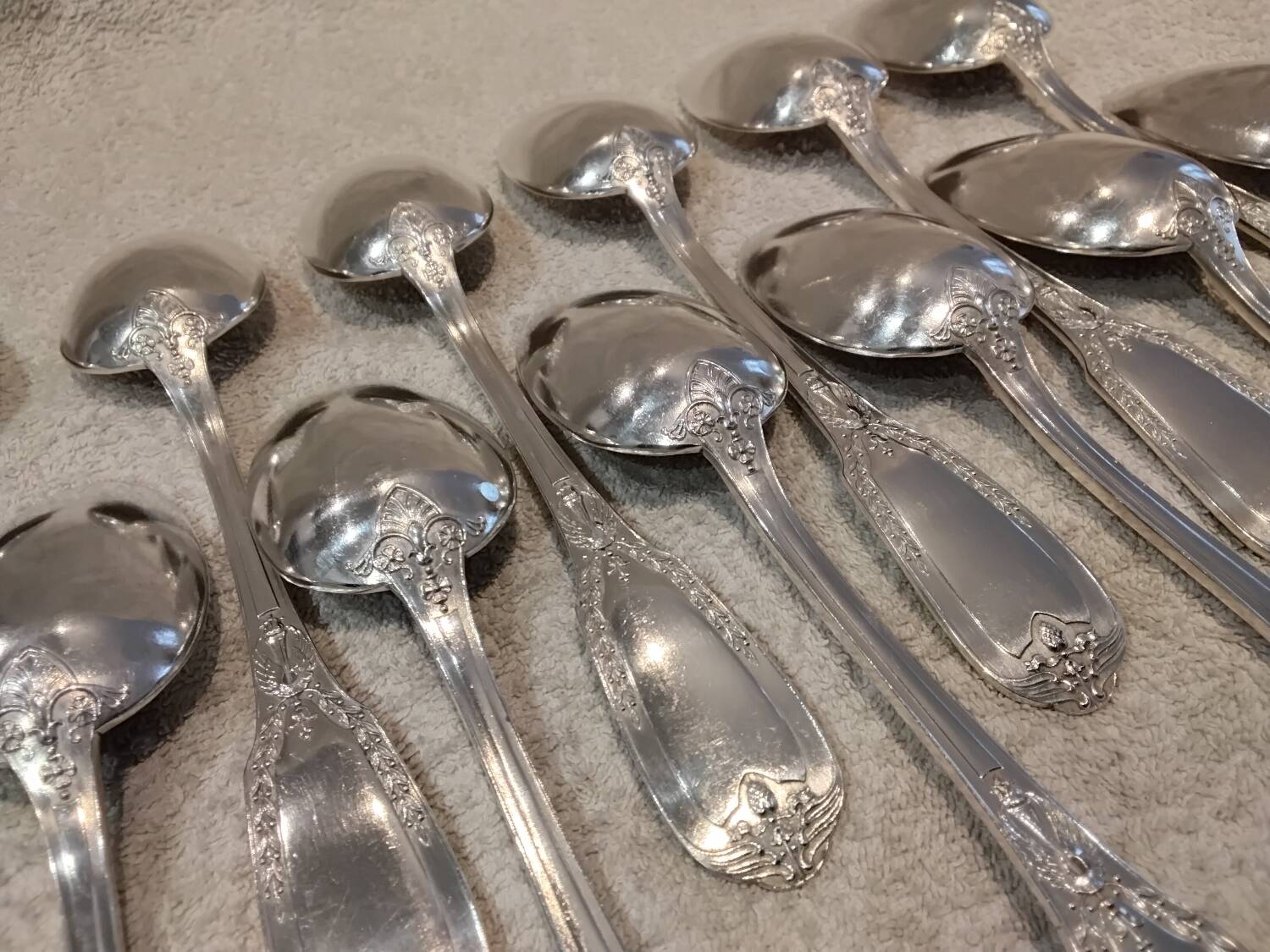 12 silver-plated metal soup spoons by Ravinet & Cie, Empire 81.
