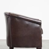 dark cowhide club chair in English style