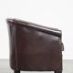 dark cowhide club chair in English style