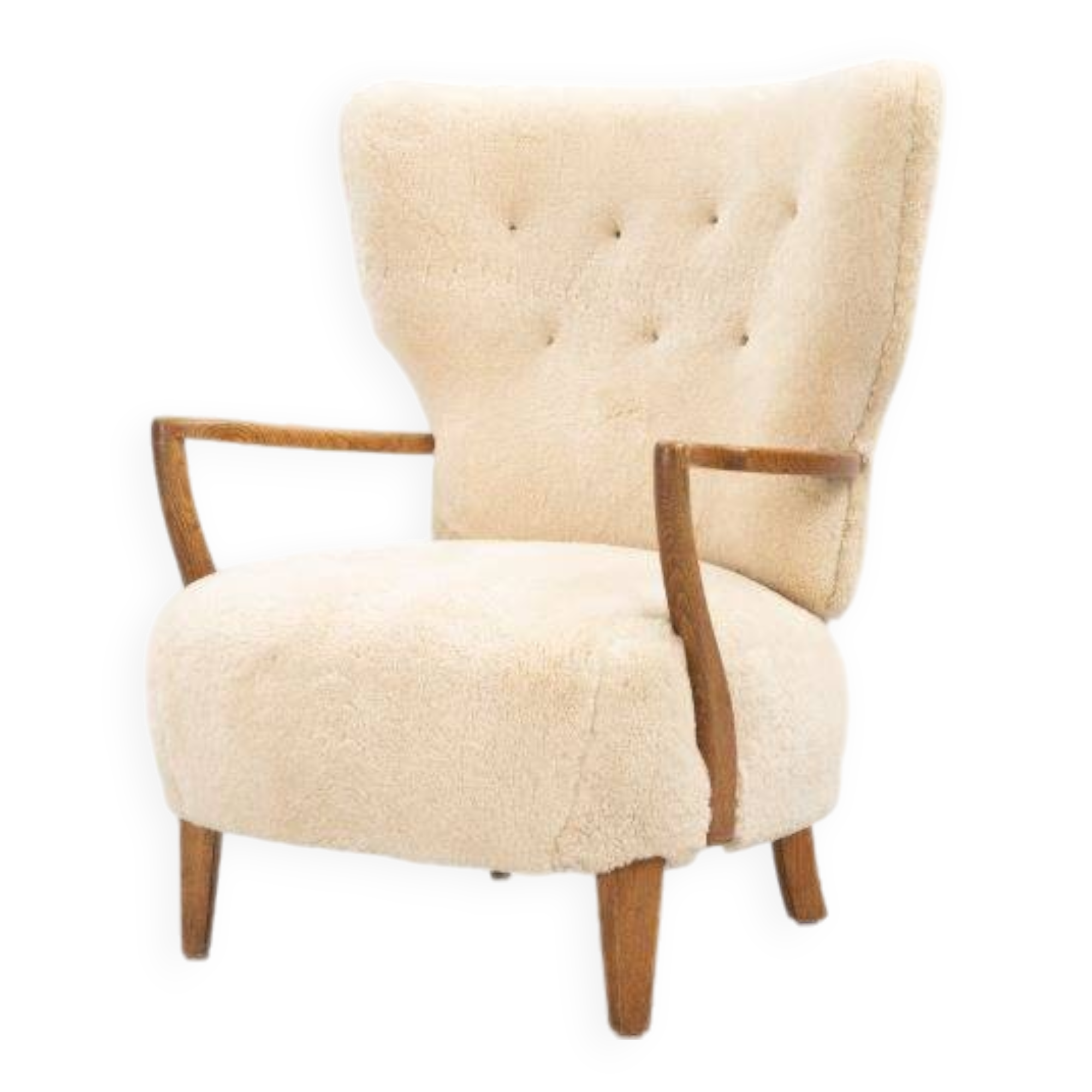 Danish armchair. upholstered with Australian lambskin. Danish Cabinmaker, 1940's