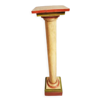 Decorative column in painted turned wood