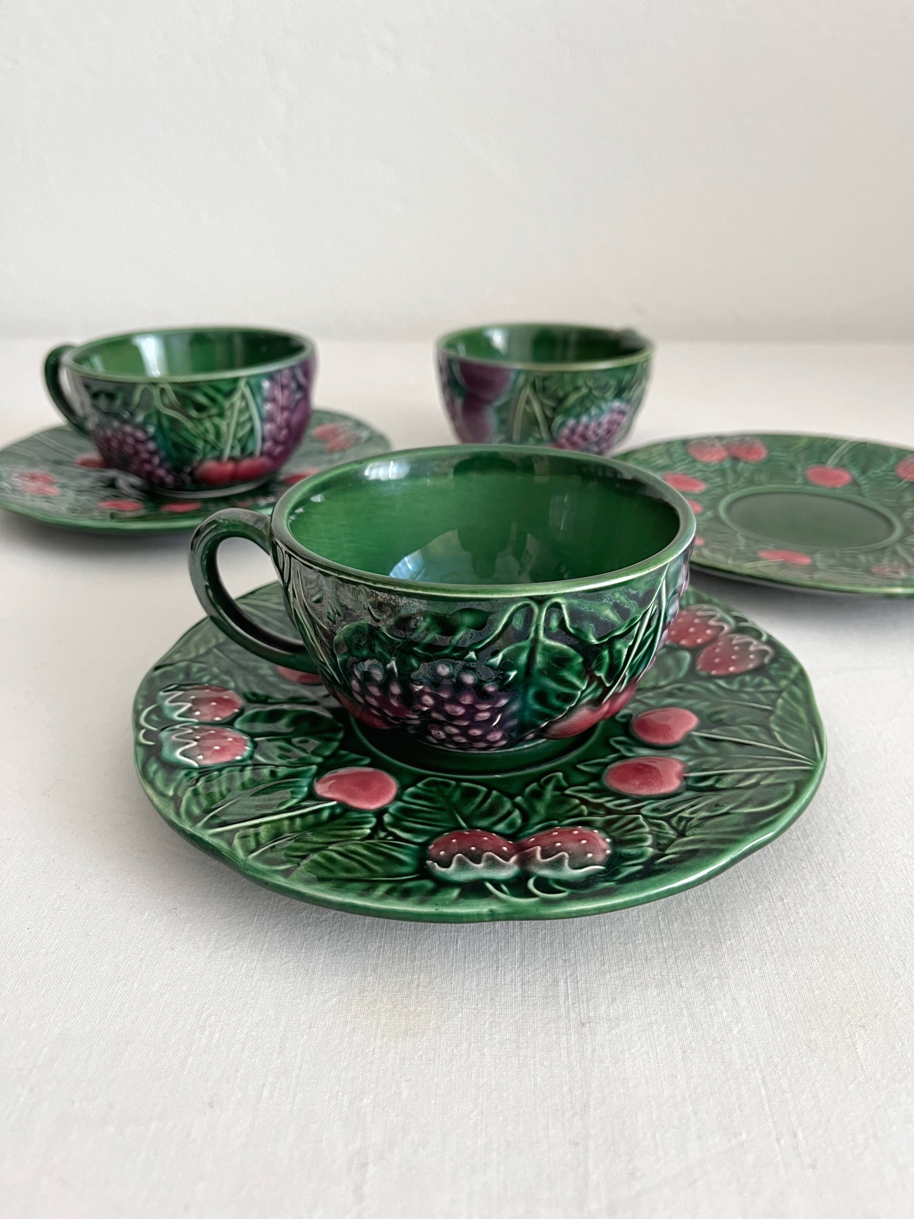 3 earthenware cups and saucers in barbotine fruit decor Salins vintage