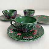 3 earthenware cups and saucers in barbotine fruit decor Salins vintage