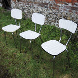 3 old white Formica chairs