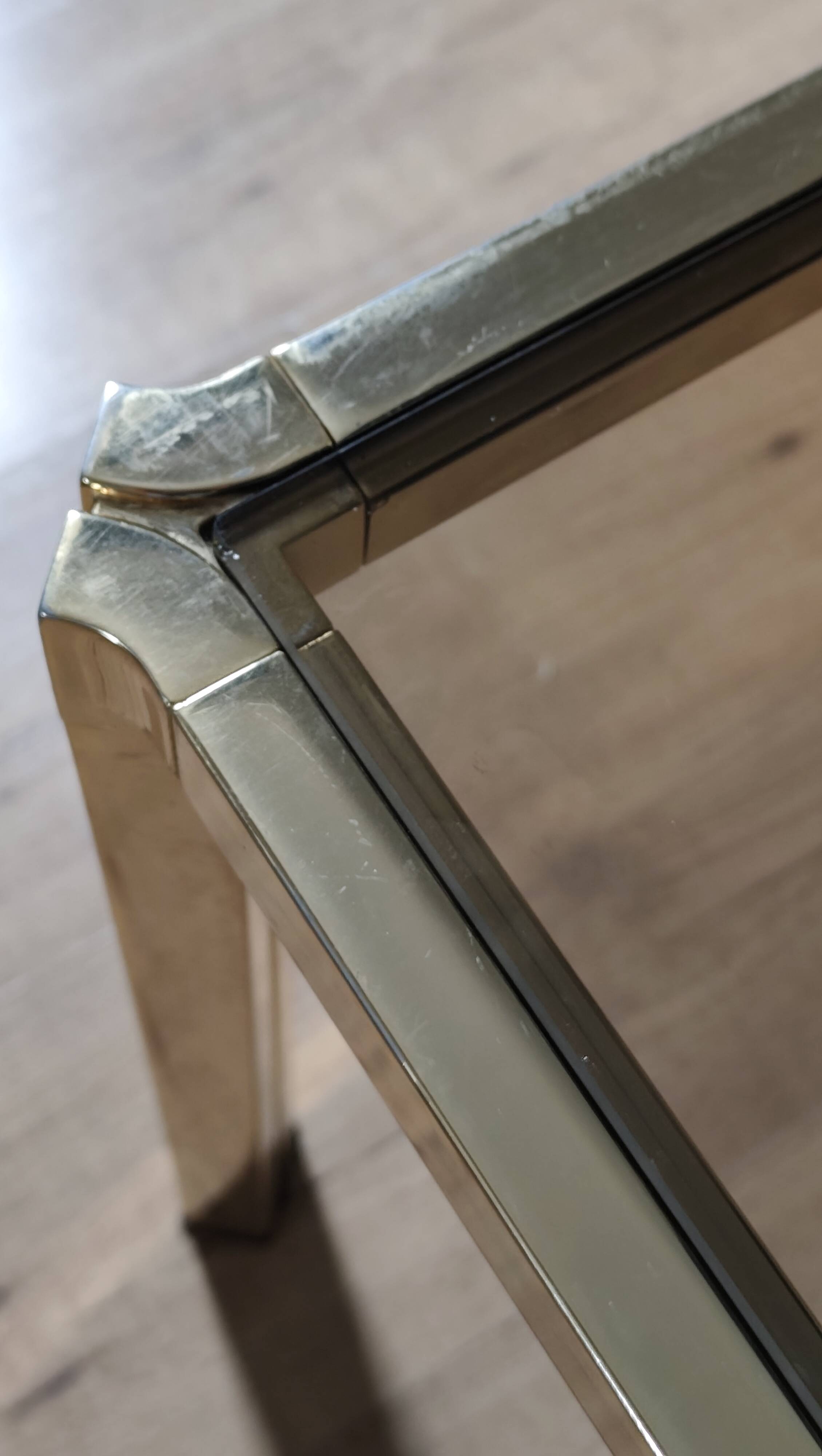 Brass coffee table with smoked glass top