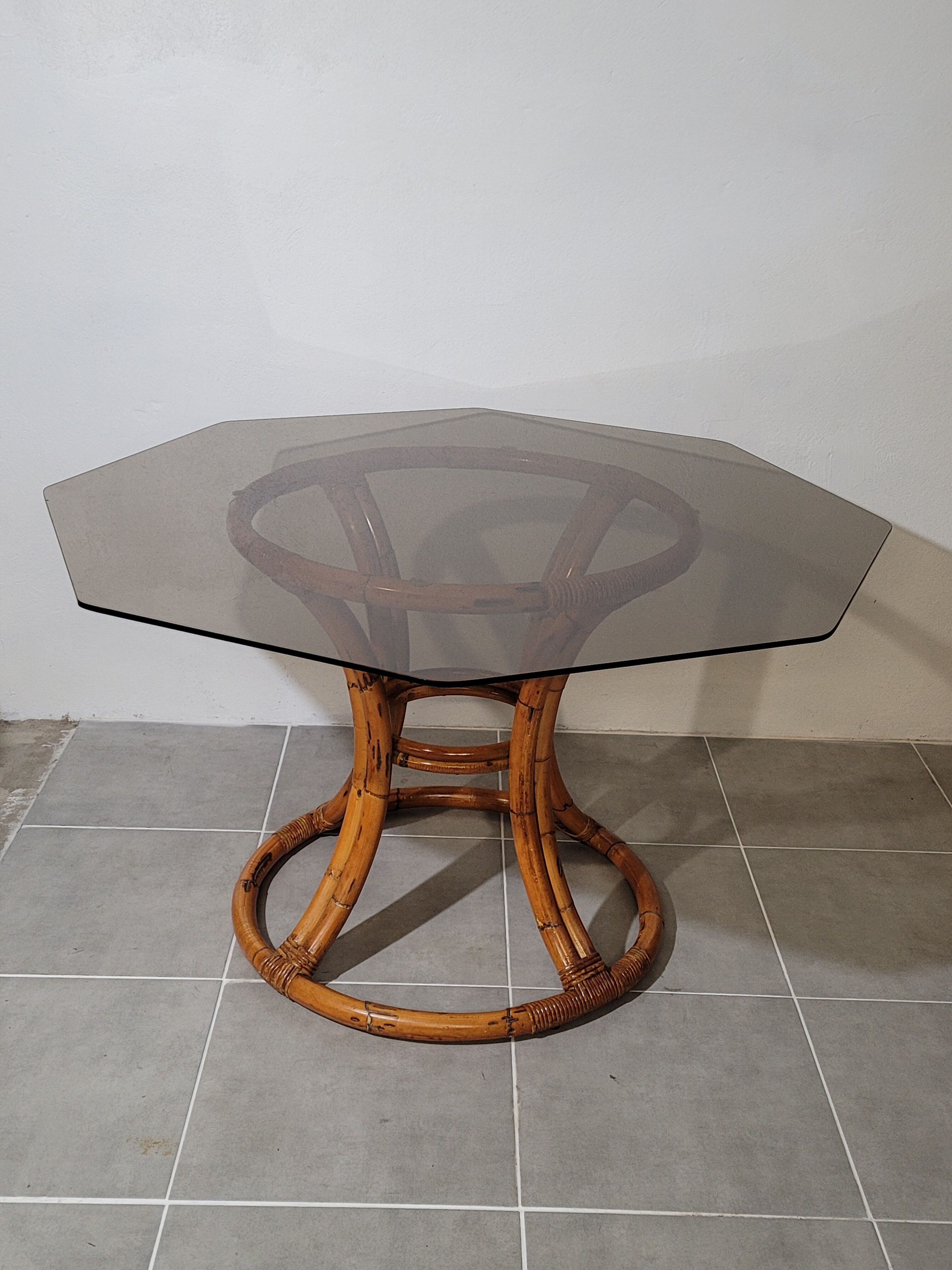 Rattan table and smoked glass