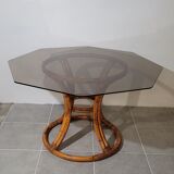 Rattan table and smoked glass