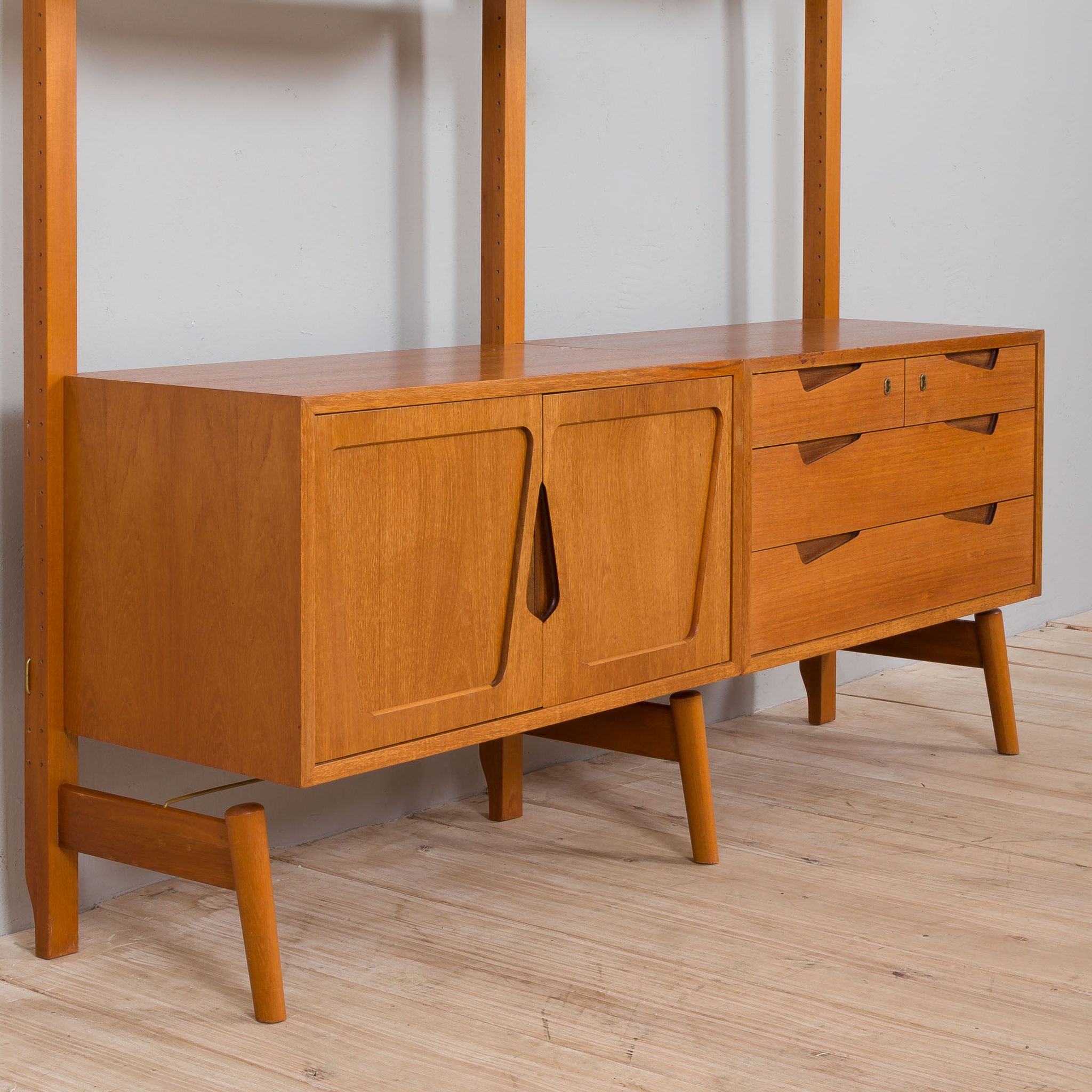 Rival 2 bay free standing teak wall unit with 3 cabinets and 3 shelves by Brodrene Jatogs Norway, Kj