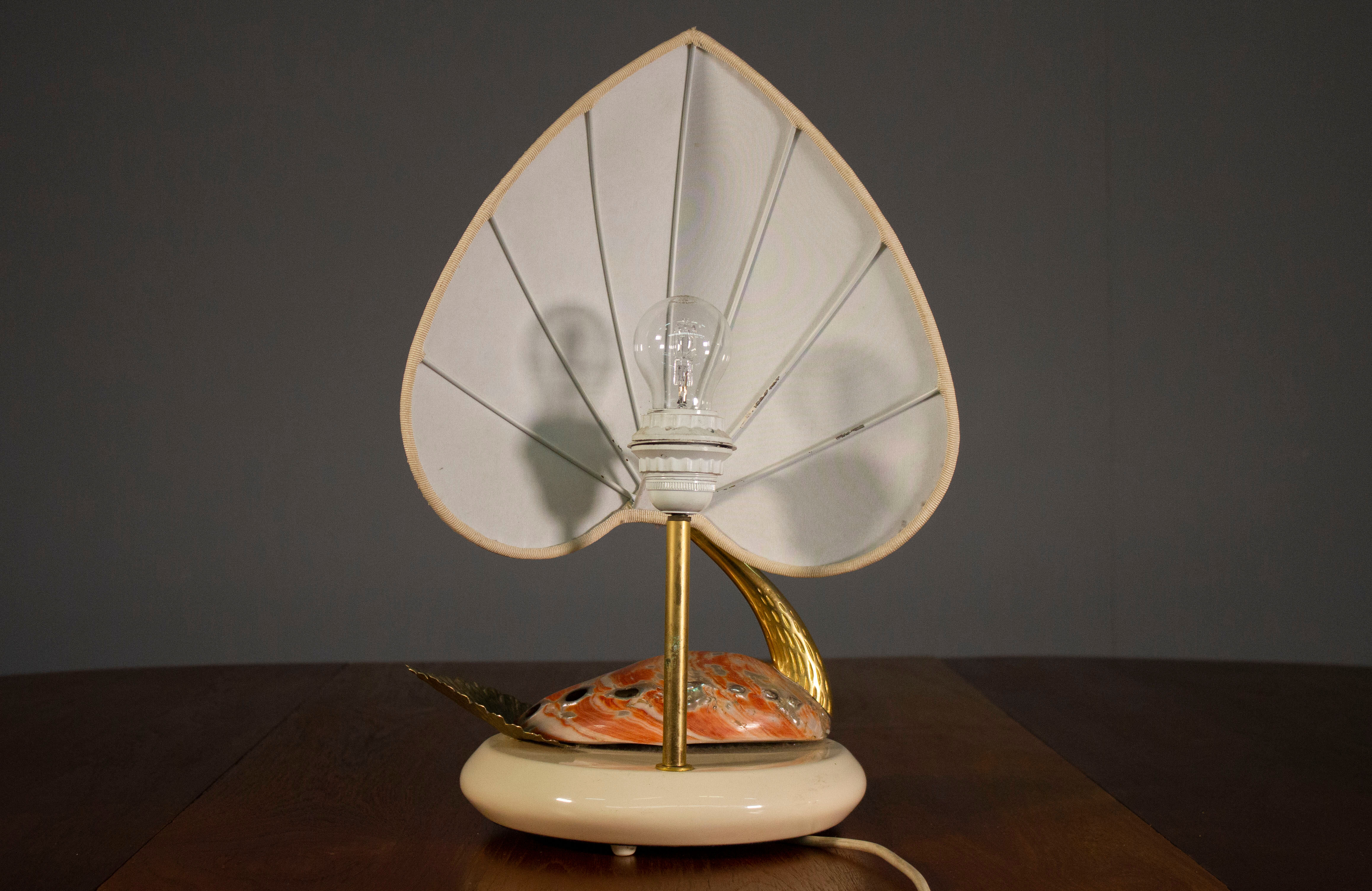 Table lamp, Cigno, made of steel and Nautilus shells, by Antonio Pavi