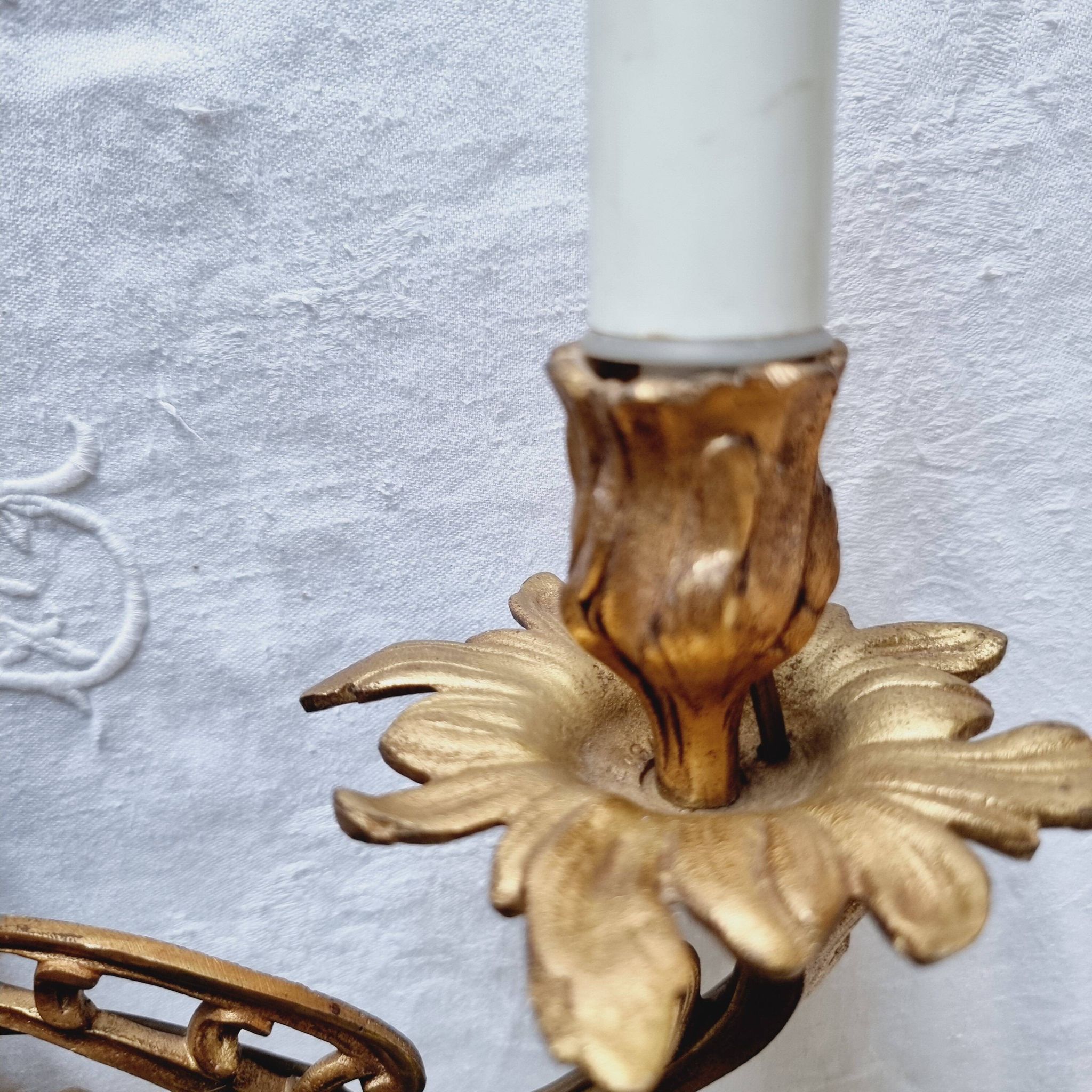 Pair of vintage French wall sconces in bronze, Louis XV Rococo style.