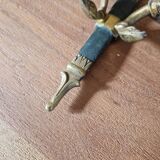 Pair of Empire-style wall sconces in gilded bronze and green lacquer.