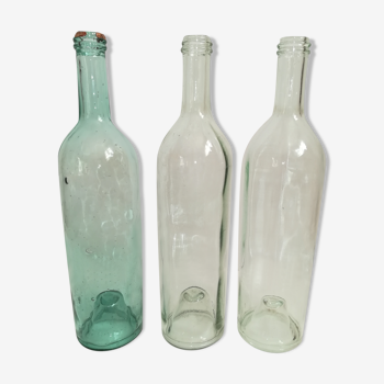 Trio de bouteilles anciennes