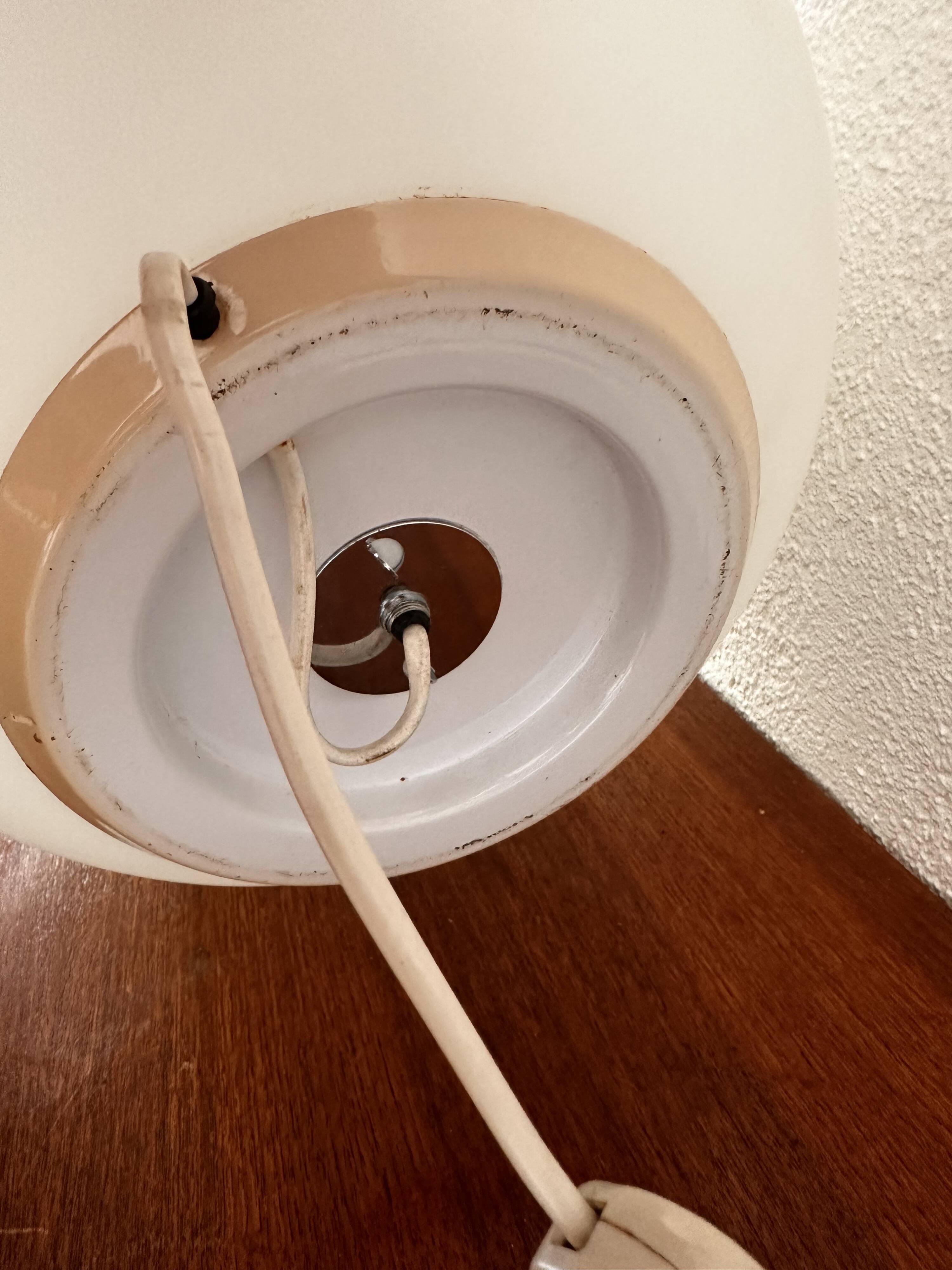 Two opal glass egg lamps