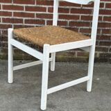 Vintage chair with wicker seat, minimalist design