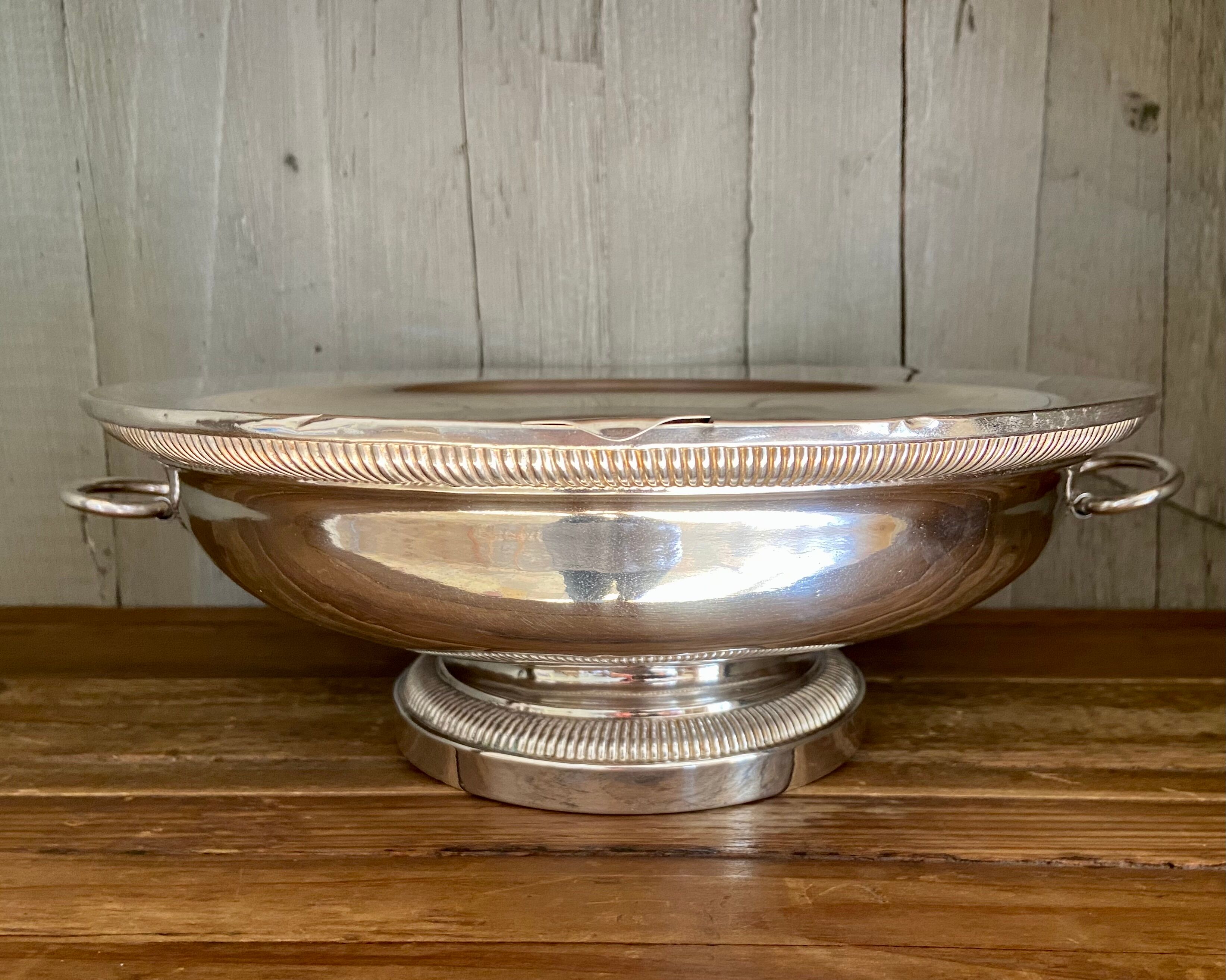 Old silver metal trivet