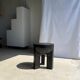 Black mango wood tripod side table with a semi-spherical top, height: 45 cm, diameter: 44 cm.