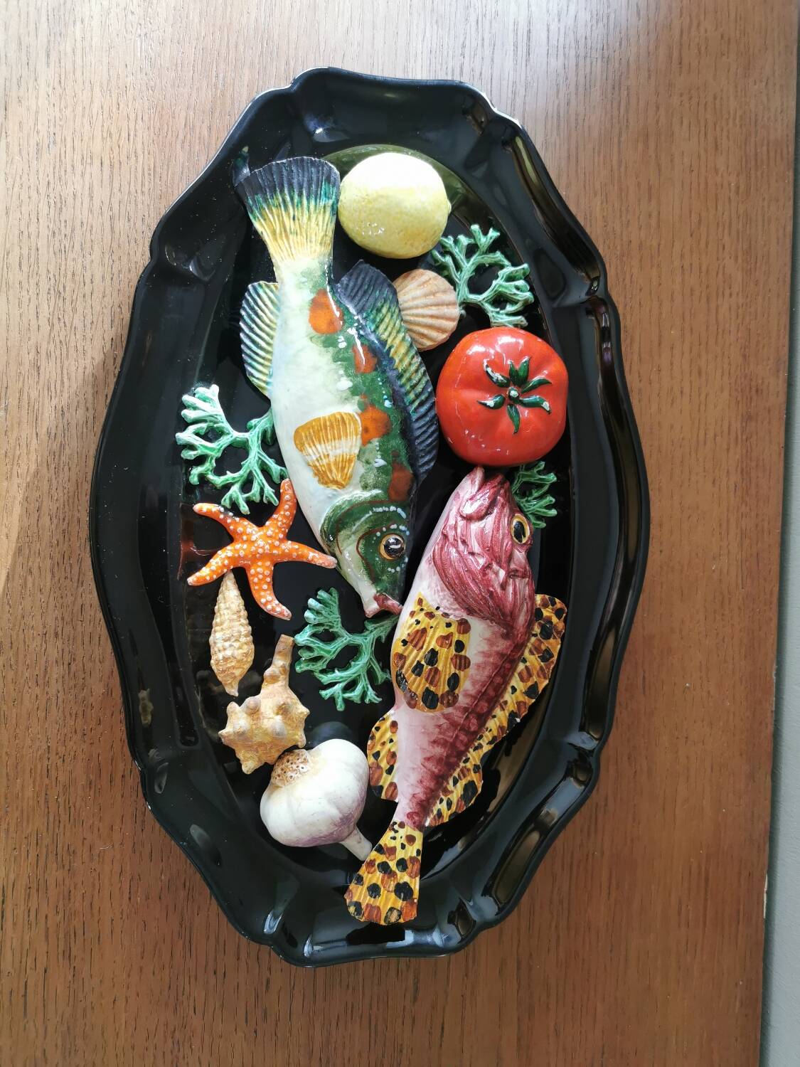 Vintage barbotine dish with fish decoration in relief