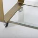 Vintage coffee table in gold metal and double glass top, 70s