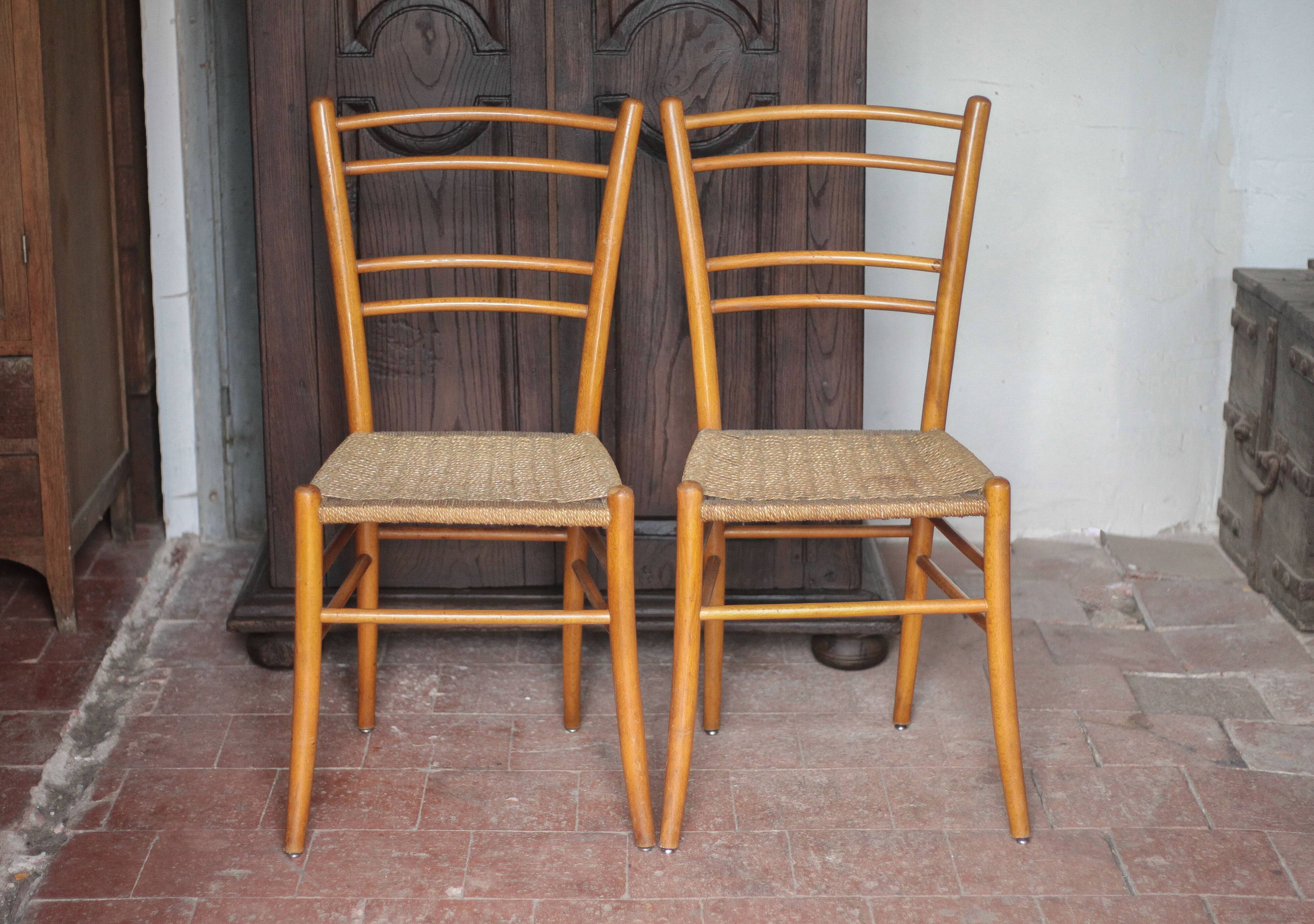 Pair of wooden chairs with vintage rope seats, vintage rope chairs