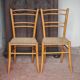 Pair of wooden chairs with vintage corded seats, vintage corded chair.