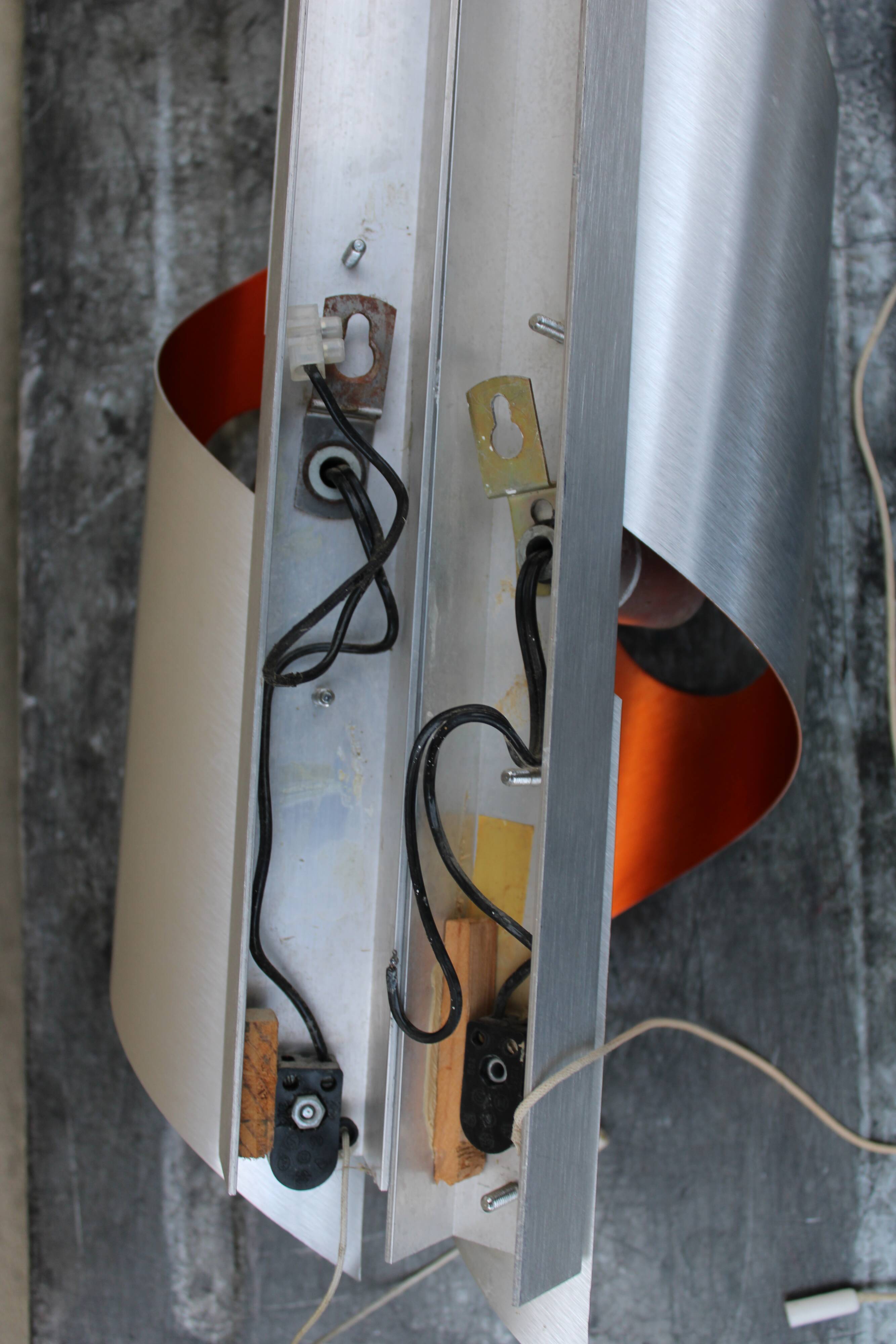 Pair of orange brushed aluminum wall light