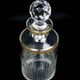 Flacon Baccarat modèle Nancy, cristal taillé et liseré doré, avant 1936