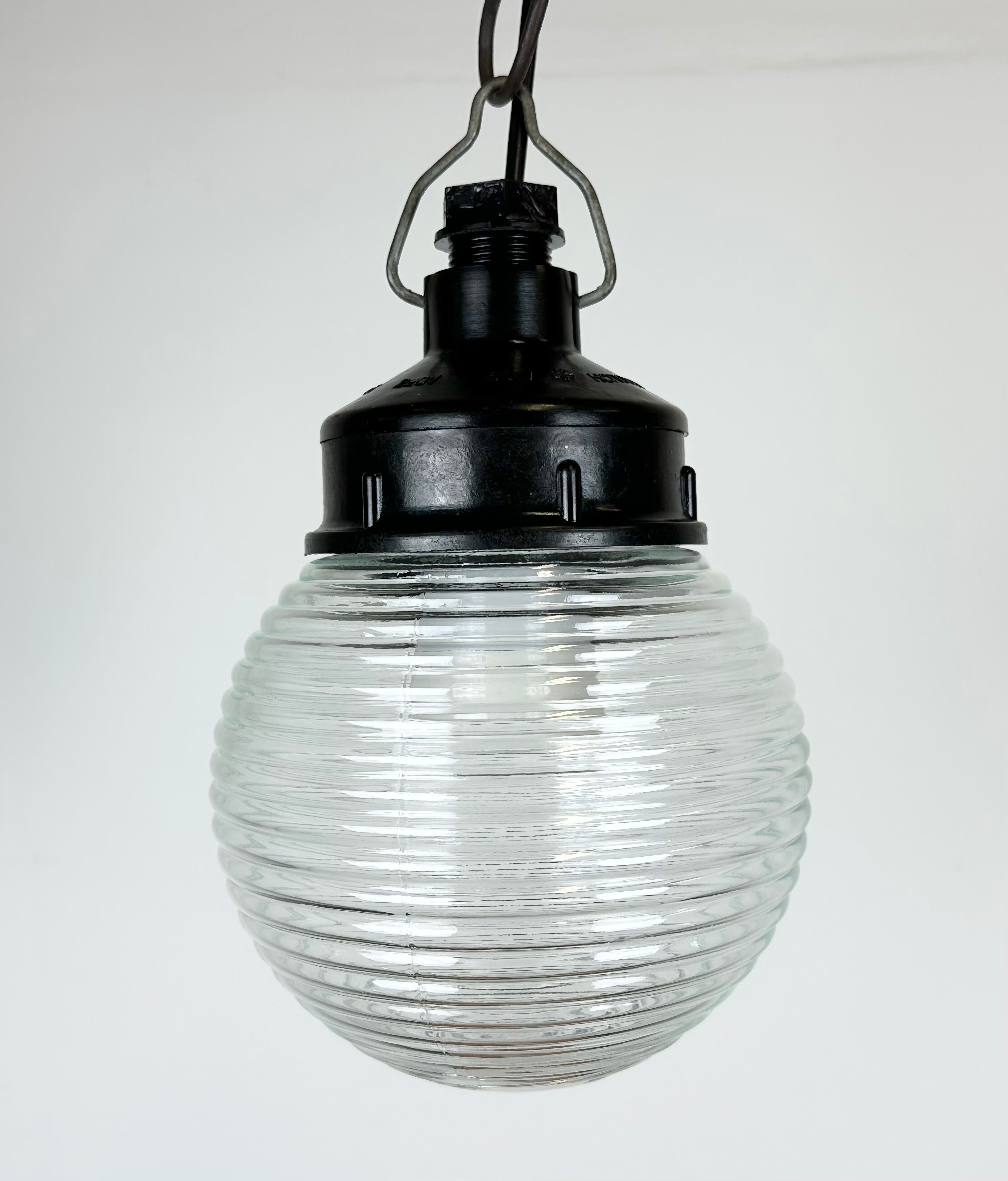 Industrial bakelite pendant light with ribbed glass, 1970s