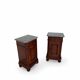 A pair of antique walnut bedside tables from the 1890s.