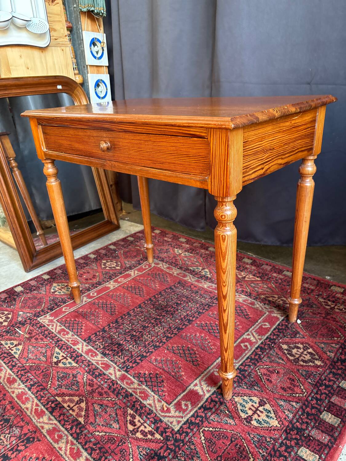 Small solid wood desk with a drawer.