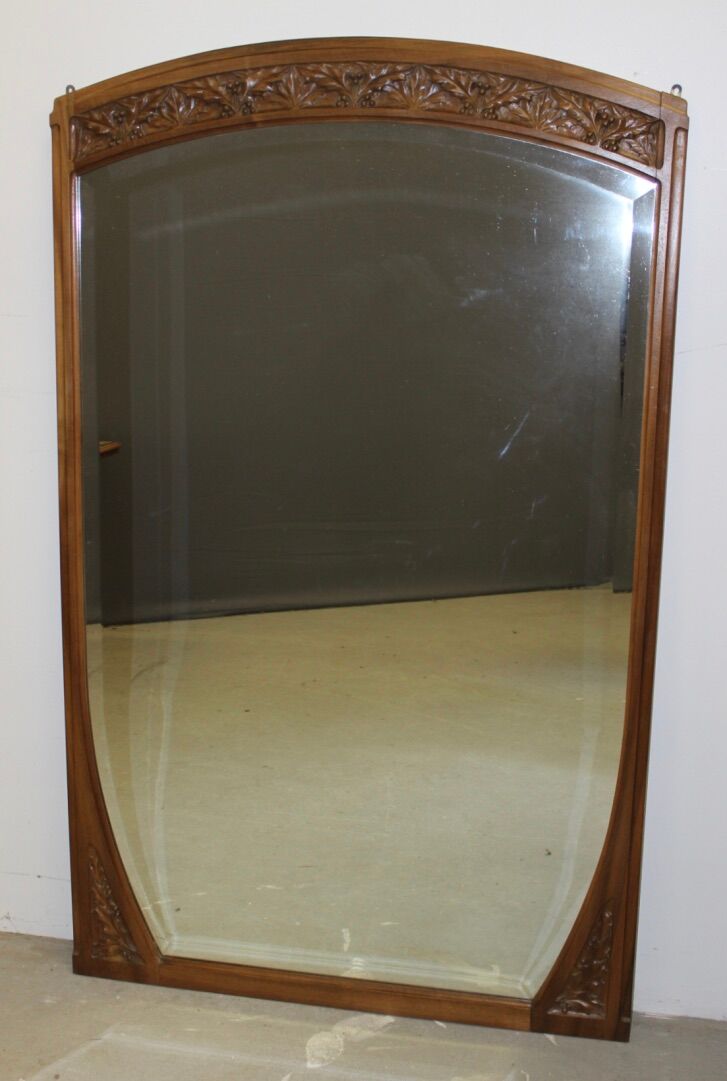 Art Nouveau walnut mirror decorated with holly leaves circa 1900 105x171cm