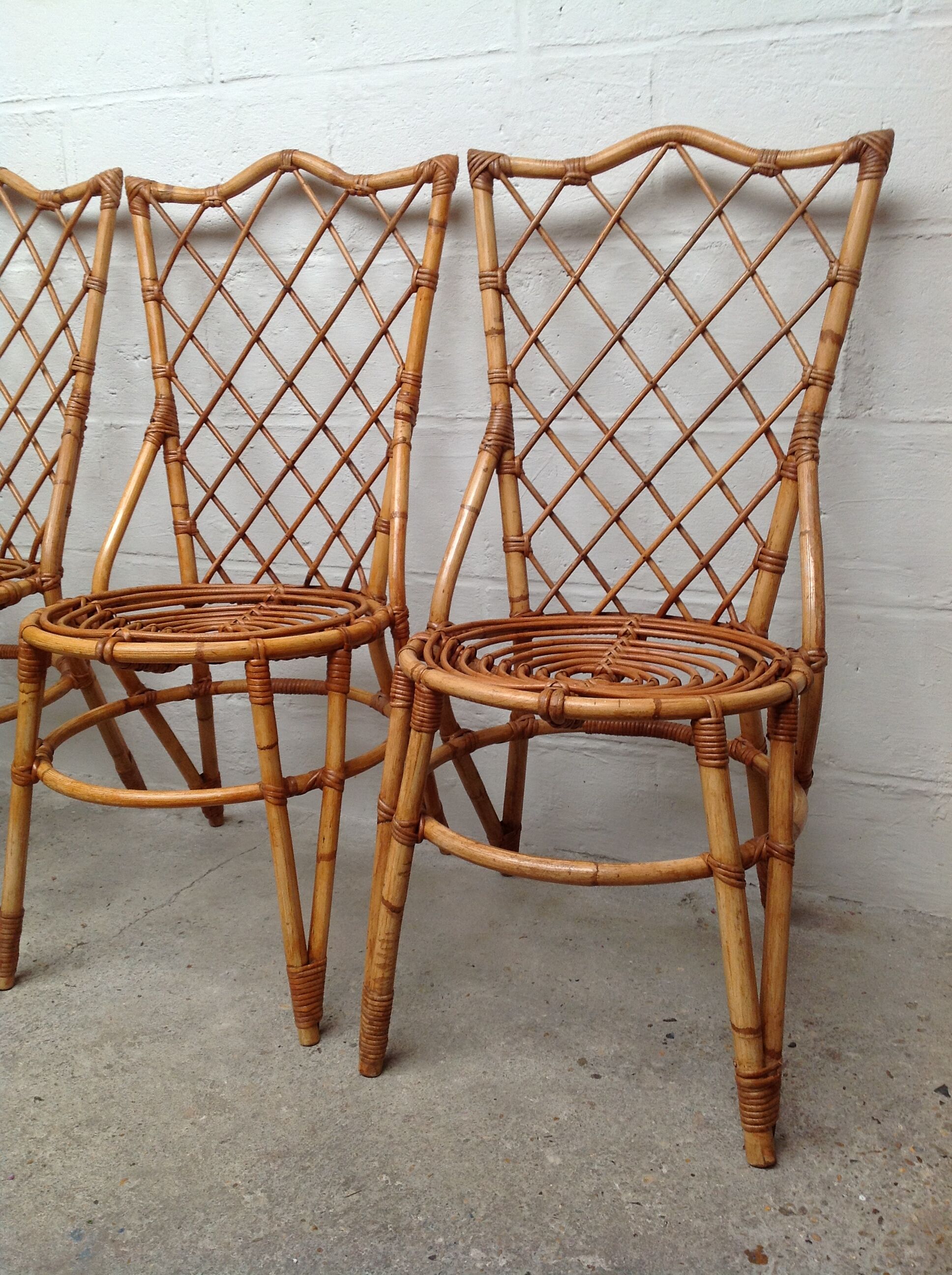 Rattan chairs by Louis Sognot