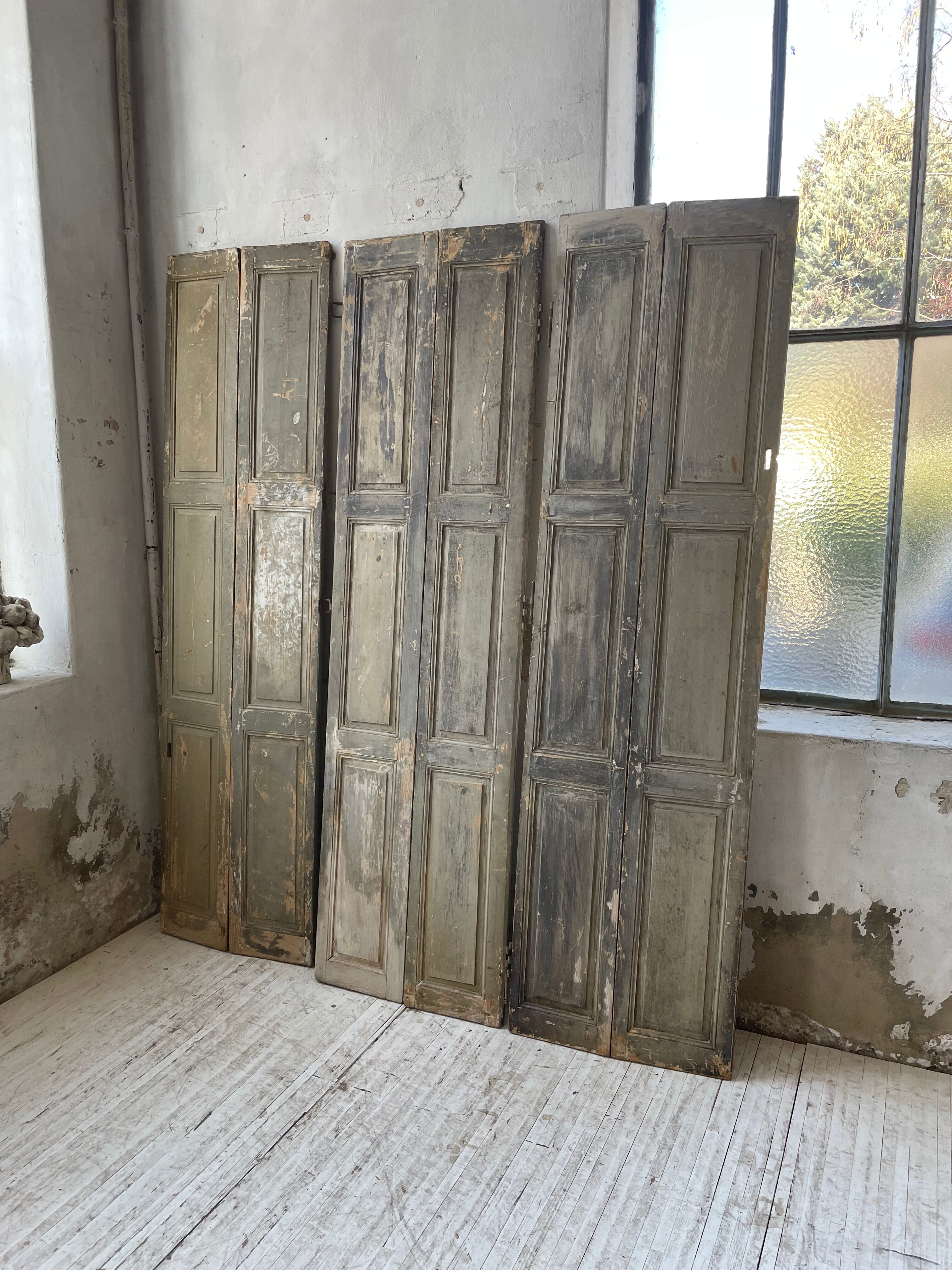 Trio of shutters louvers patina blue gray