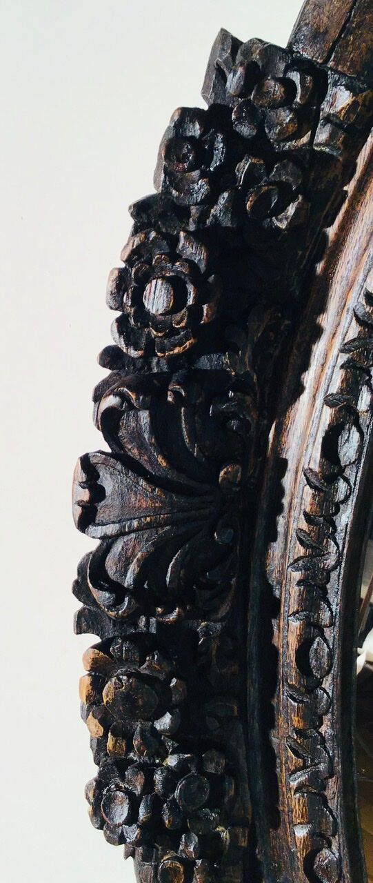 Oval mirror on an 18th century frame