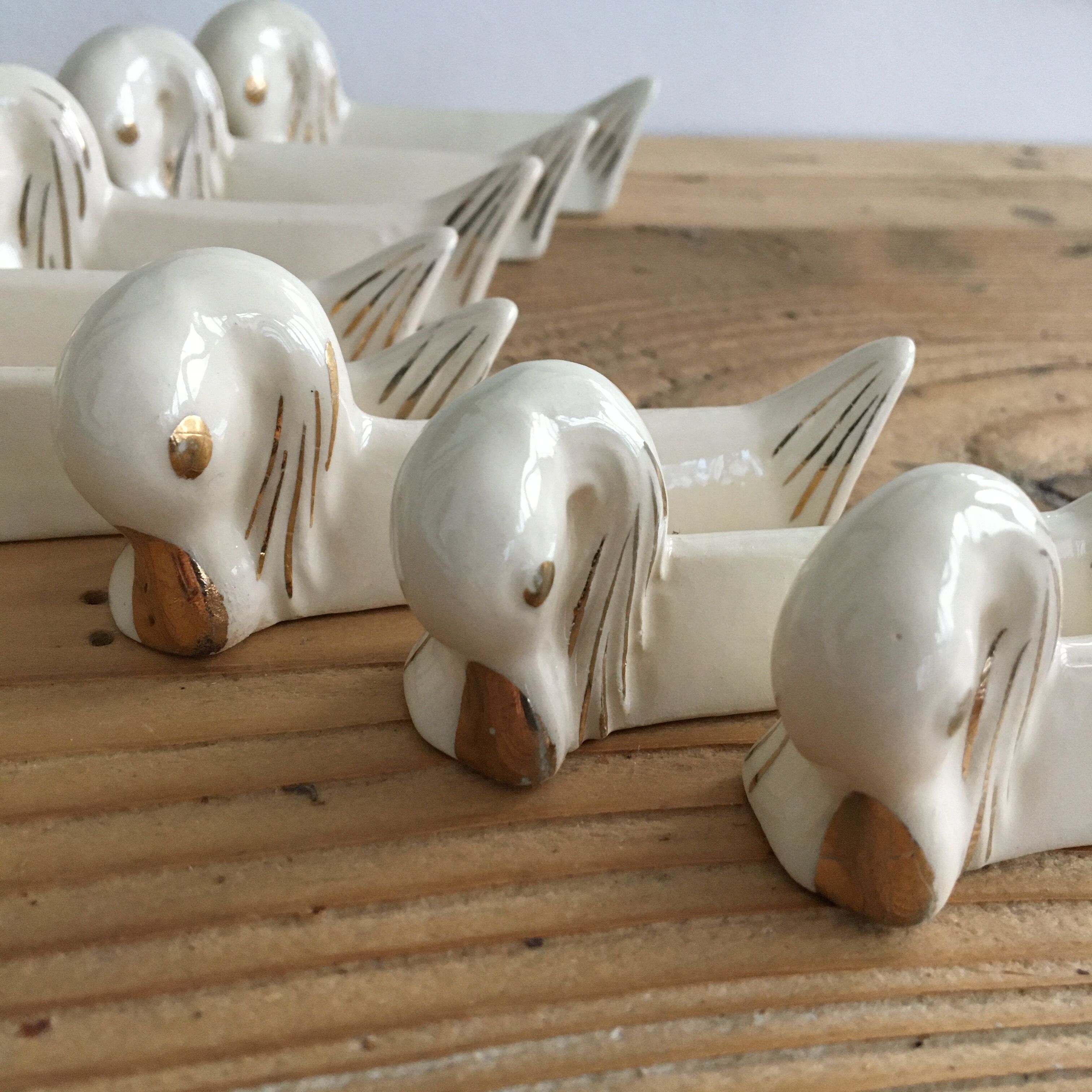 Set of 8 ceramic swan knife holders 50s