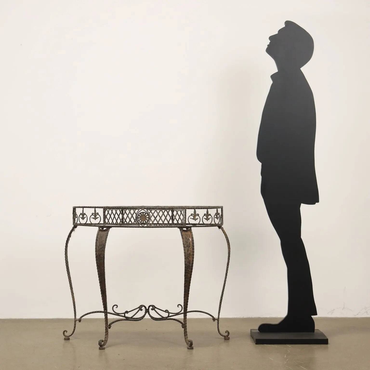 Old iron console painted with tin decorations, 20th century.