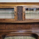 According to Gauthier-Poinsignon: large two-body buffet from the Art Nouveau period in walnut and burl.
