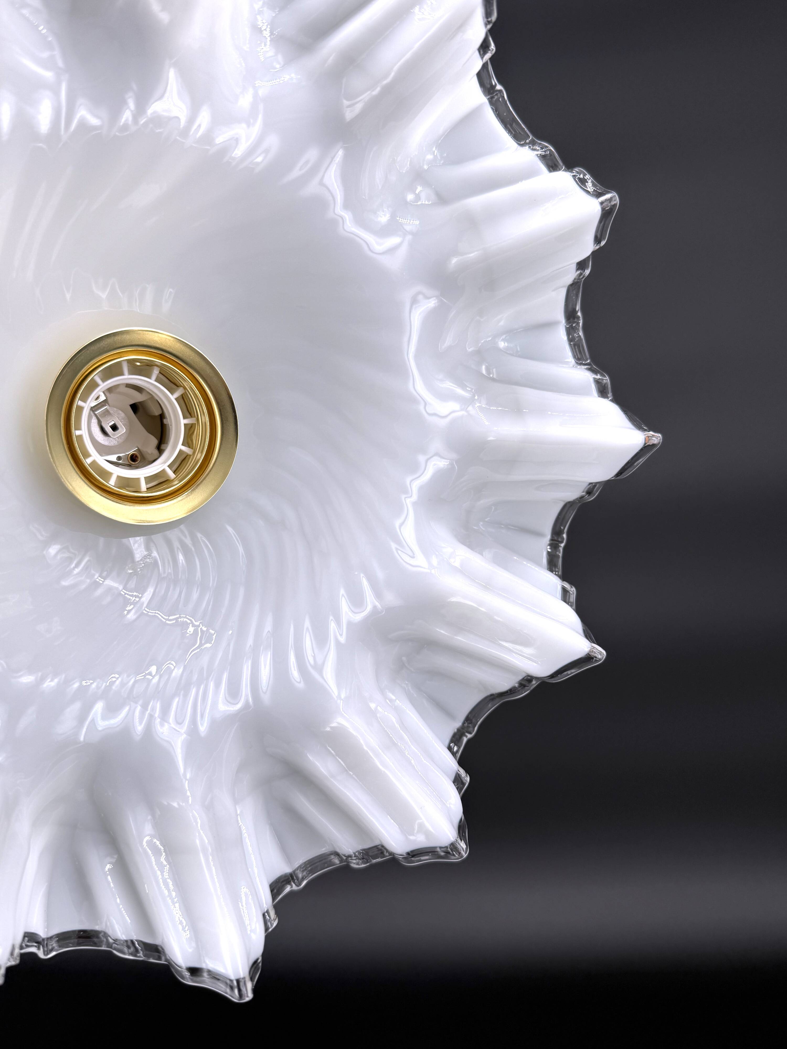 White opaline glass pendant light with draped shape