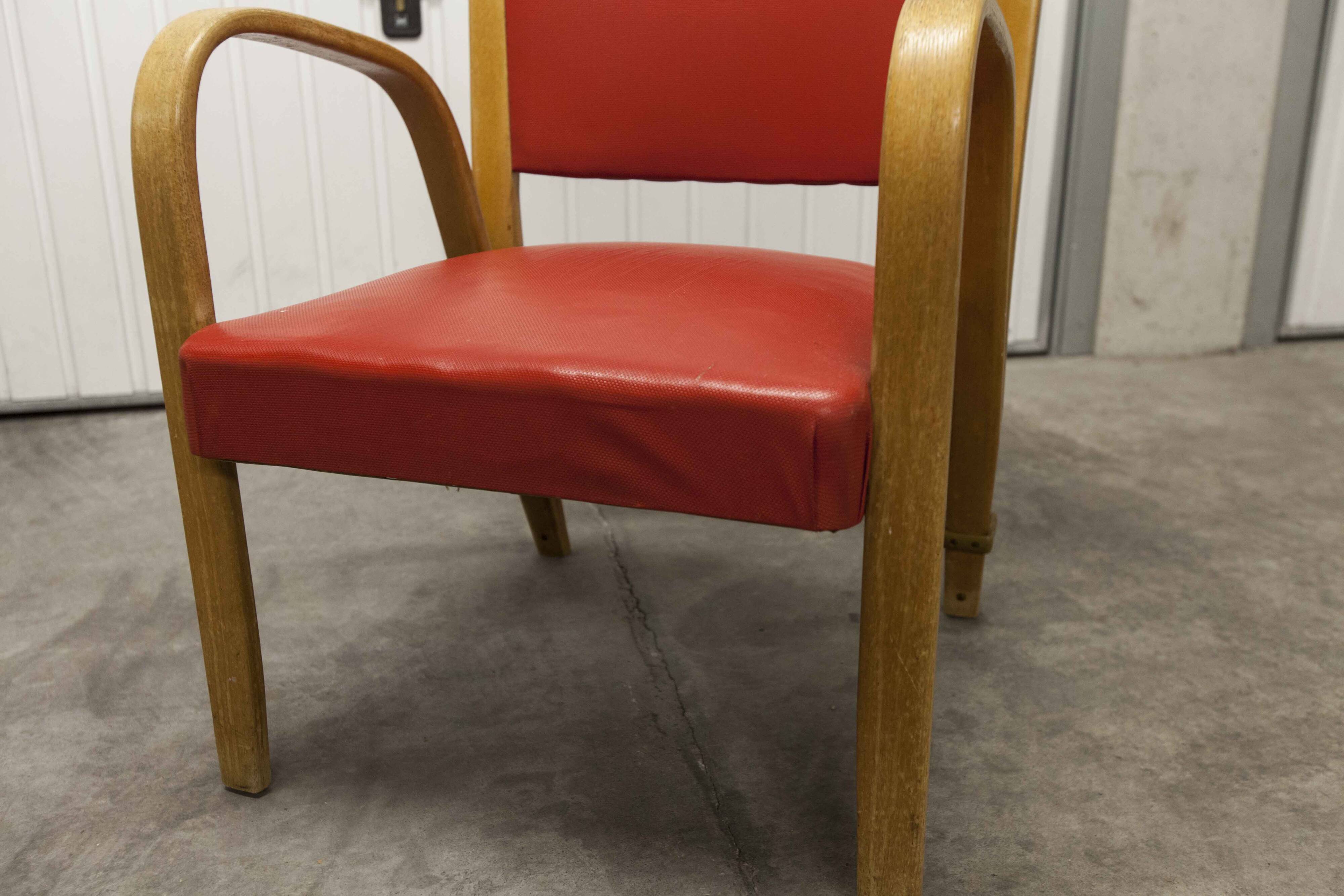 Bow wood armchair by Hugues Steiner 1960 red